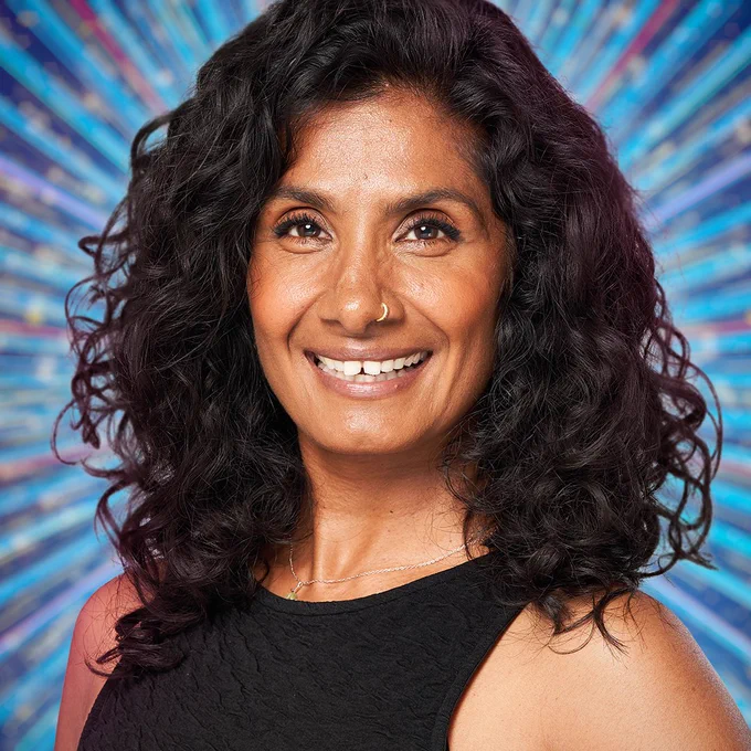 A head and shoulders shot of Balvinder Sopal smiling for the camera wearing a black top